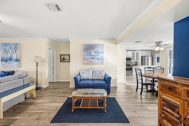 Spacious 3-bedroom, 2-bath condo featuring wood-look tile on Quail Ridge Golf Course and Country Club in Florida - for sale on GolfHomes.com, golf home, golf lot