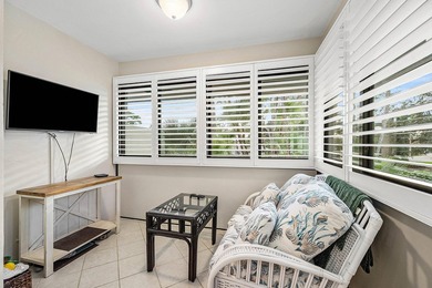 Spacious 3-bedroom, 2-bath condo featuring wood-look tile on Quail Ridge Golf Course and Country Club in Florida - for sale on GolfHomes.com, golf home, golf lot