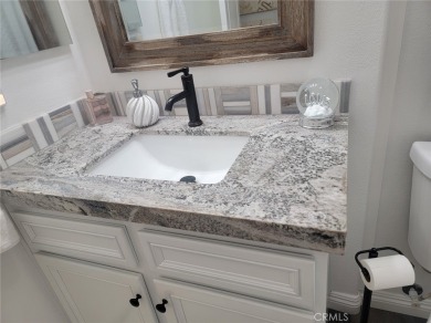 This beautiful KHovnanian built home has been recently updated on Hemet Golf Club in California - for sale on GolfHomes.com, golf home, golf lot