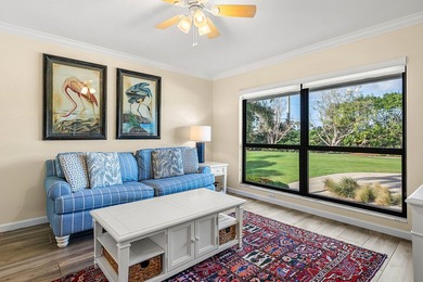 Spacious 3-bedroom, 2-bath condo featuring wood-look tile on Quail Ridge Golf Course and Country Club in Florida - for sale on GolfHomes.com, golf home, golf lot