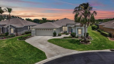 This thoughtfully expanded Jacaranda model offers 4 bedrooms, 3 on Summerglen Country Club in Florida - for sale on GolfHomes.com, golf home, golf lot