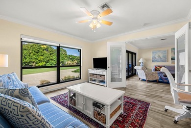 Spacious 3-bedroom, 2-bath condo featuring wood-look tile on Quail Ridge Golf Course and Country Club in Florida - for sale on GolfHomes.com, golf home, golf lot