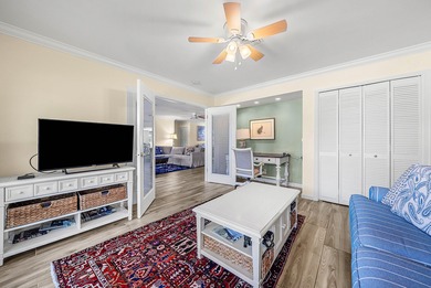 Spacious 3-bedroom, 2-bath condo featuring wood-look tile on Quail Ridge Golf Course and Country Club in Florida - for sale on GolfHomes.com, golf home, golf lot