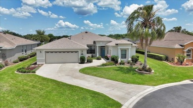 This thoughtfully expanded Jacaranda model offers 4 bedrooms, 3 on Summerglen Country Club in Florida - for sale on GolfHomes.com, golf home, golf lot