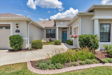 This thoughtfully expanded Jacaranda model offers 4 bedrooms, 3 on Summerglen Country Club in Florida - for sale on GolfHomes.com, golf home, golf lot