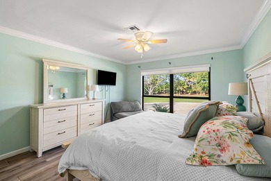 Spacious 3-bedroom, 2-bath condo featuring wood-look tile on Quail Ridge Golf Course and Country Club in Florida - for sale on GolfHomes.com, golf home, golf lot