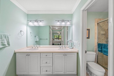 Spacious 3-bedroom, 2-bath condo featuring wood-look tile on Quail Ridge Golf Course and Country Club in Florida - for sale on GolfHomes.com, golf home, golf lot