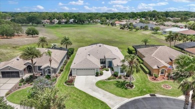 This thoughtfully expanded Jacaranda model offers 4 bedrooms, 3 on Summerglen Country Club in Florida - for sale on GolfHomes.com, golf home, golf lot