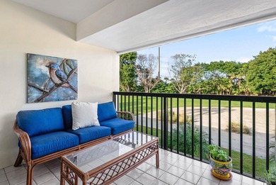 Spacious 3-bedroom, 2-bath condo featuring wood-look tile on Quail Ridge Golf Course and Country Club in Florida - for sale on GolfHomes.com, golf home, golf lot