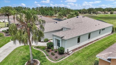 This thoughtfully expanded Jacaranda model offers 4 bedrooms, 3 on Summerglen Country Club in Florida - for sale on GolfHomes.com, golf home, golf lot