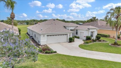This thoughtfully expanded Jacaranda model offers 4 bedrooms, 3 on Summerglen Country Club in Florida - for sale on GolfHomes.com, golf home, golf lot
