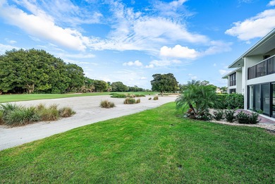Spacious 3-bedroom, 2-bath condo featuring wood-look tile on Quail Ridge Golf Course and Country Club in Florida - for sale on GolfHomes.com, golf home, golf lot