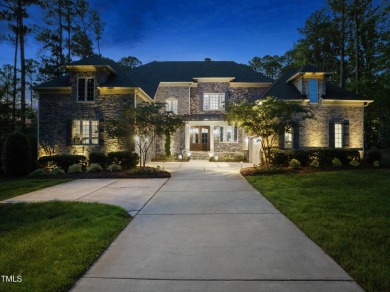 Experience luxury and lifestyle in this exceptional 5-bedroom, 5 on Hasentree Club in North Carolina - for sale on GolfHomes.com, golf home, golf lot