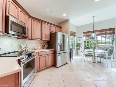 This beautifully maintained corner coach home features the on The Colony Golf and Country Club in Florida - for sale on GolfHomes.com, golf home, golf lot