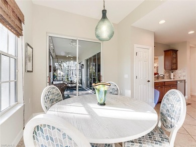 This beautifully maintained corner coach home features the on The Colony Golf and Country Club in Florida - for sale on GolfHomes.com, golf home, golf lot