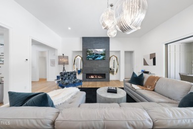 Experience luxury and lifestyle in this exceptional 5-bedroom, 5 on Hasentree Club in North Carolina - for sale on GolfHomes.com, golf home, golf lot