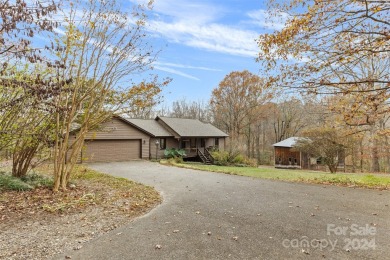 Tucked away in the woods, this 2-bedroom, 2-bathroom home on on River Oaks Country Club in North Carolina - for sale on GolfHomes.com, golf home, golf lot