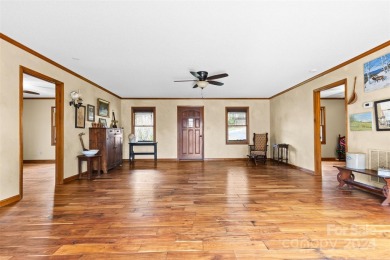 Tucked away in the woods, this 2-bedroom, 2-bathroom home on on River Oaks Country Club in North Carolina - for sale on GolfHomes.com, golf home, golf lot