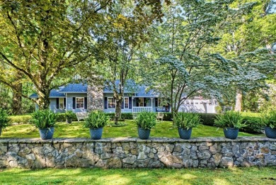 Lovely one story home with a beautiful level yard with mature on Wildcat Cliffs Country Club in North Carolina - for sale on GolfHomes.com, golf home, golf lot