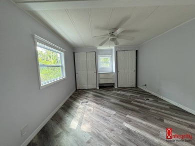 BEAUTIFULLY RENOVATED 2 BED, 2 BATH HOME LOCATED 7 MILES FROM on Rolling Green Golf Course in Florida - for sale on GolfHomes.com, golf home, golf lot