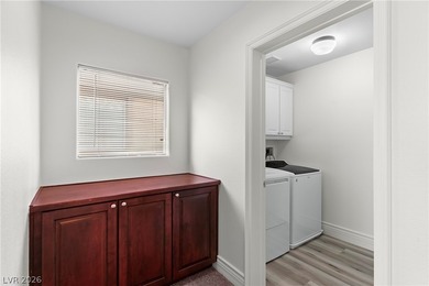 Updated, move-in ready two-story home located in the Rhodes on Rhodes Ranch Golf Club in Nevada - for sale on GolfHomes.com, golf home, golf lot