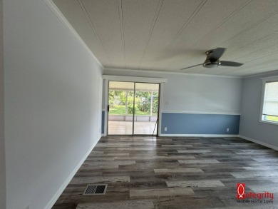 BEAUTIFULLY RENOVATED 2 BED, 2 BATH HOME LOCATED 7 MILES FROM on Rolling Green Golf Course in Florida - for sale on GolfHomes.com, golf home, golf lot