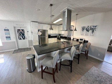 This beautiful 2-bedroom, 2-bathroom Barrington home is being on Del Tura Golf and Country Club in Florida - for sale on GolfHomes.com, golf home, golf lot