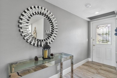 Beautifully renovated 2-bedroom, 2-bath first-floor residence on Quail Ridge Golf Course and Country Club in Florida - for sale on GolfHomes.com, golf home, golf lot