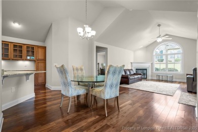 Enjoy maintenance free golf front living! This stunning on Mid South Club in North Carolina - for sale on GolfHomes.com, golf home, golf lot