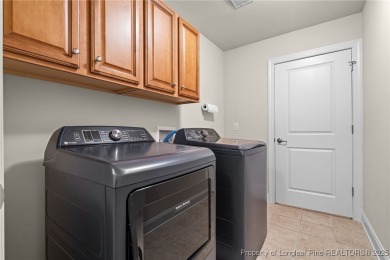 Enjoy maintenance free golf front living! This stunning on Mid South Club in North Carolina - for sale on GolfHomes.com, golf home, golf lot