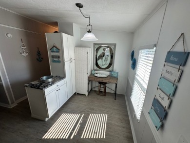 This beautiful 2-bedroom, 2-bathroom Barrington home is being on Del Tura Golf and Country Club in Florida - for sale on GolfHomes.com, golf home, golf lot