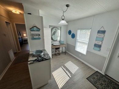 This beautiful 2-bedroom, 2-bathroom Barrington home is being on Del Tura Golf and Country Club in Florida - for sale on GolfHomes.com, golf home, golf lot