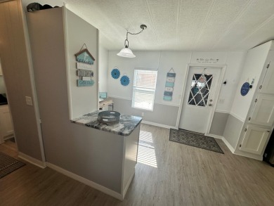 This beautiful 2-bedroom, 2-bathroom Barrington home is being on Del Tura Golf and Country Club in Florida - for sale on GolfHomes.com, golf home, golf lot