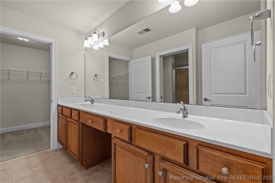Enjoy maintenance free golf front living! This stunning on Mid South Club in North Carolina - for sale on GolfHomes.com, golf home, golf lot