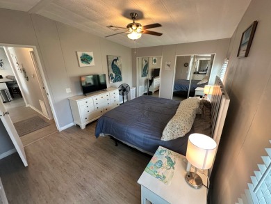 This beautiful 2-bedroom, 2-bathroom Barrington home is being on Del Tura Golf and Country Club in Florida - for sale on GolfHomes.com, golf home, golf lot