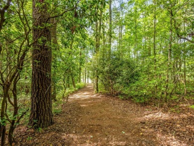Located off Cherokee Point, this private .915-acre homesite on Lake Toxaway Country Club in North Carolina - for sale on GolfHomes.com, golf home, golf lot