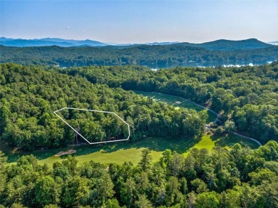 Located off Cherokee Point, this private .915-acre homesite on Lake Toxaway Country Club in North Carolina - for sale on GolfHomes.com, golf home, golf lot