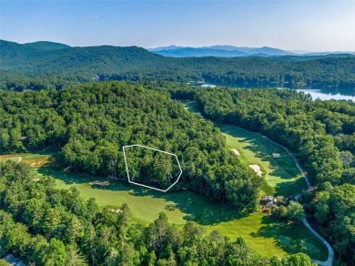 Located off Cherokee Point, this private .915-acre homesite on Lake Toxaway Country Club in North Carolina - for sale on GolfHomes.com, golf home, golf lot