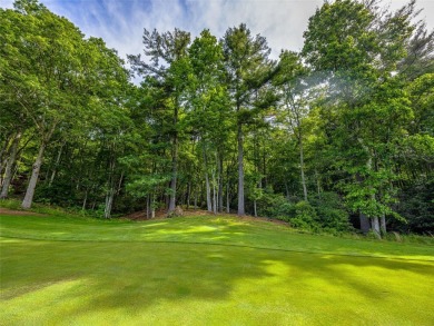 Located off Cherokee Point, this private .915-acre homesite on Lake Toxaway Country Club in North Carolina - for sale on GolfHomes.com, golf home, golf lot