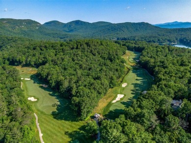 Located off Cherokee Point, this private .915-acre homesite on Lake Toxaway Country Club in North Carolina - for sale on GolfHomes.com, golf home, golf lot