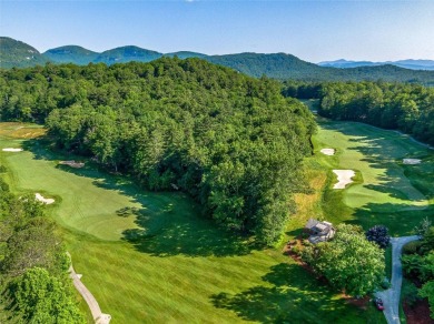 Located off Cherokee Point, this private .915-acre homesite on Lake Toxaway Country Club in North Carolina - for sale on GolfHomes.com, golf home, golf lot