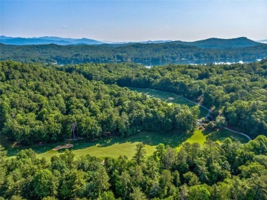 Located off Cherokee Point, this private .915-acre homesite on Lake Toxaway Country Club in North Carolina - for sale on GolfHomes.com, golf home, golf lot