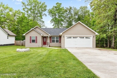 Nestled in the desirable Lake Tansi Village community of on Lake Tansi Village Country Club in Tennessee - for sale on GolfHomes.com, golf home, golf lot