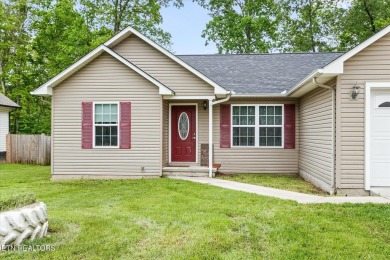 Nestled in the desirable Lake Tansi Village community of on Lake Tansi Village Country Club in Tennessee - for sale on GolfHomes.com, golf home, golf lot