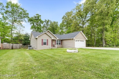 Nestled in the desirable Lake Tansi Village community of on Lake Tansi Village Country Club in Tennessee - for sale on GolfHomes.com, golf home, golf lot
