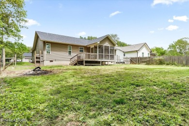 Nestled in the desirable Lake Tansi Village community of on Lake Tansi Village Country Club in Tennessee - for sale on GolfHomes.com, golf home, golf lot