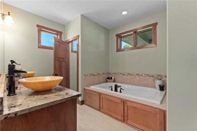 Stunning custom-built 2-story home nestled on the 13th hole of on Riverwood National in Minnesota - for sale on GolfHomes.com, golf home, golf lot
