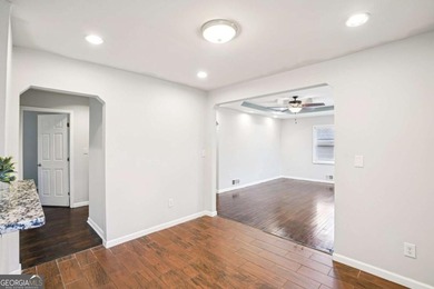 Charming brick ranch on a basement, perfectly positioned in a on Browns Mill Golf Course in Georgia - for sale on GolfHomes.com, golf home, golf lot