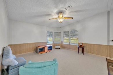 55+ Community!!! Move in Ready with lots of storage. Located in on Sweetwater Golf and Tennis Club in Florida - for sale on GolfHomes.com, golf home, golf lot