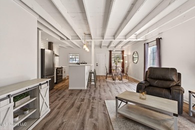 Fully renovated and thoughtfully designed in Timber Ridge, this on Pass Christian Isles Golf Club in Mississippi - for sale on GolfHomes.com, golf home, golf lot